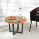 Round 24-inch teak wood end table with epoxy resin top, perfect for outdoor patio or indoor living spaces.