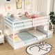 Twin over twin low bunk bed in white with storage stairs and safety guardrails, perfect for kids' rooms.
