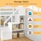 Storage stairs of the twin over twin low bunk bed in white, featuring compartments for books, toys, and storage boxes.