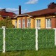 Artificial hedge boxwood panels featuring diverse leaves, ideal for privacy screens and green wall backdrops outdoors.