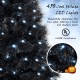 Black artificial Halloween Christmas tree with 450 cool white LED lights, featuring realistic PVC branch tips for.