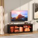 Modern TV stand in brown with LED light, adjustable shelves, and open compartments for TVs up to 65 inches.