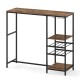 Rustic brown long bar table with storage shelves, wine racks, and stemware holders for versatile dining and.