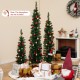 Set of 3 pre-lit artificial Christmas trees with warm white LED lights, perfect for festive decoration in small spaces.