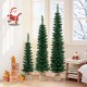 Set of 3 pre-lit artificial Christmas trees with 415 green branch tips, perfect for festive decoration in small spaces.