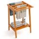 Freestanding towel rack made of premium Indonesian teak with storage shelf, ideal for bathroom and pool use.