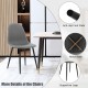 Gray dining chair with black metal legs, ergonomic backrest, and foam upholstery for comfort in various settings.