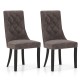 Set of 2 tufted dining chairs with gray velvet upholstery and ergonomic high backrest for elegant dining spaces.