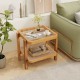 Rattan 2-tier end side table with tempered glass top and acacia wood legs, perfect for small spaces and stylish storage.