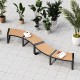 Curved patio bench with slatted acacia wood seat and metal legs, ideal for backyard or poolside relaxation.