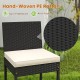 Close-up of hand-woven PE rattan chair with soft cushion, designed for comfort and durability in outdoor settings.