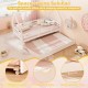 Twin house bed with pull-out trundle in white, featuring flexible wheels and protective fences for added safety.