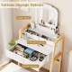 Adjustable height vanity desk set in white with LED mirror, open shelf, and 3 drawers for organized makeup storage.