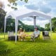 Pop up canopy tent in white, featuring a portable wheeled bag, ideal for outdoor activities and sun protection.