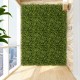 Artificial hedge eucalyptus panels in a vibrant green, perfect for creating privacy screens or green wall backdrops.