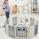 16-panel beige baby activity center play yard with lock door, featuring an owl pattern and non-slip foot mats for.