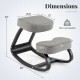 Wooden ergonomic rocking kneeling chair with padded grey cushion, featuring dimensions for active sitting and support.