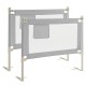 Toddler bedrail in gray with side pocket, featuring 24 adjustable heights for safety and convenience.