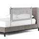 Toddler bedrail in gray with side pocket, adjustable to 24 heights, designed for safety and convenience on various bed.