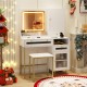 Modern makeup vanity desk in white with LED mirror, storage drawers, and matching stool, ideal for organized beauty.
