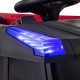 Close-up of the blue LED light on the 12V kids ride-on fire truck, featuring a sleek design for fun outdoor play.