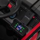 Center console of the 12V kids ride-on fire truck featuring controls, battery display, and entertainment options.