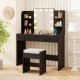 Vanity set in black featuring a lighted mirror, cushioned stool, and ample storage with drawers and shelves for beauty.