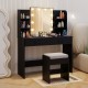 Vanity set in black featuring a lighted mirror, cushioned stool, and storage drawers for efficient organization.