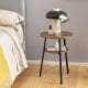 Round end table with walnut finish, featuring a triangular metal frame and open shelves, perfect for bedroom or living.
