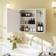 Bathroom medicine cabinet with single mirror door, white finish, featuring adjustable shelves and open compartments for.