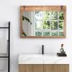 Barn door wall mirror with natural wood frame, showcasing clear reflection and versatile hanging for any farmhouse.