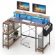 L-shaped gaming desk in rustic brown with LED lights, ample storage, and ergonomic monitor stand for enhanced workspace.