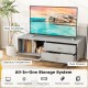 Gray TV stand featuring a wide countertop, spacious compartment, and dual drawers for versatile storage solutions.