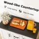 Rolling kitchen island cart with wood-like countertop, storage cabinets, and drawers for organized kitchen use.