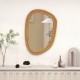 Irregular PVC rattan wall mirror with wooden frame, 33"x23.5", perfect for entryway or living room decor.