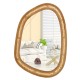 Irregular PVC rattan wall mirror with a natural wooden frame, perfect for entryway or living room decor.