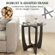 Round end side table with tempered glass top and robust rubber wood X-shaped frame, perfect for contemporary living.