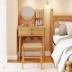 Small bamboo vanity desk set with mirror, 2 drawers, and stool, ideal for compact bedrooms and stylish storage.