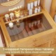 Small vanity desk with transparent tempered glass tabletop, showcasing deep storage for taller bottles and bamboo.