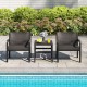 Two black rattan armchairs and a square side table by the pool, perfect for outdoor relaxation and entertaining.