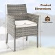 Outdoor PE rattan armchair with cozy white seat cushion, featuring a sturdy frame and dimensions for patio relaxation.