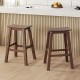 Set of 2 brown HDPE patio bar stools with curved seats and footrests, ideal for outdoor relaxation at bar height tables.