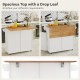 Rolling kitchen island with a spacious drop leaf top, featuring storage drawers and a tilt-out trash cabinet for.