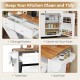 Rolling kitchen island with storage drawers, spice rack, and towel rack, featuring a drop leaf top for versatile use.