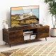Rustic brown TV stand with adjustable shelf, AC outlets, and USB ports, designed for 60-inch TVs in a modern living.