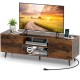 Rustic brown TV stand with power outlets, adjustable shelf, and storage for media supplies, ideal for 60-inch TVs.