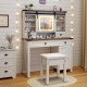 Makeup vanity desk in white with LED mirror, matching stool, and adjustable shelves for organized beauty essentials.