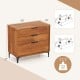 3-drawer dresser in cherry finish with metal legs, offering ample storage for bedroom or living room essentials.