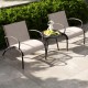 Two wide armchairs with a side table in rustic brown, perfect for outdoor patio relaxation and comfort.