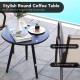 Round coffee table with smooth metal tabletop and sturdy legs, perfect for outdoor patio use with armchairs.